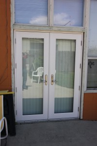 White double glass front condo door